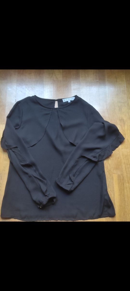 Blusa elegante de manga larga