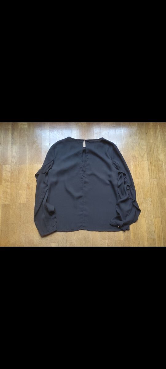 Blusa elegante de manga larga