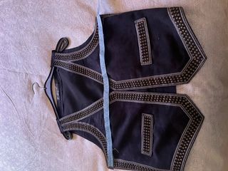 Chaleco negro tela simil cuero
