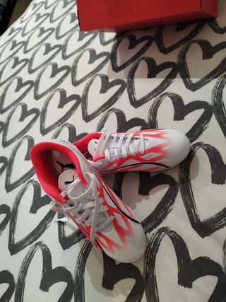 Botas de fútbol niño. con tacos