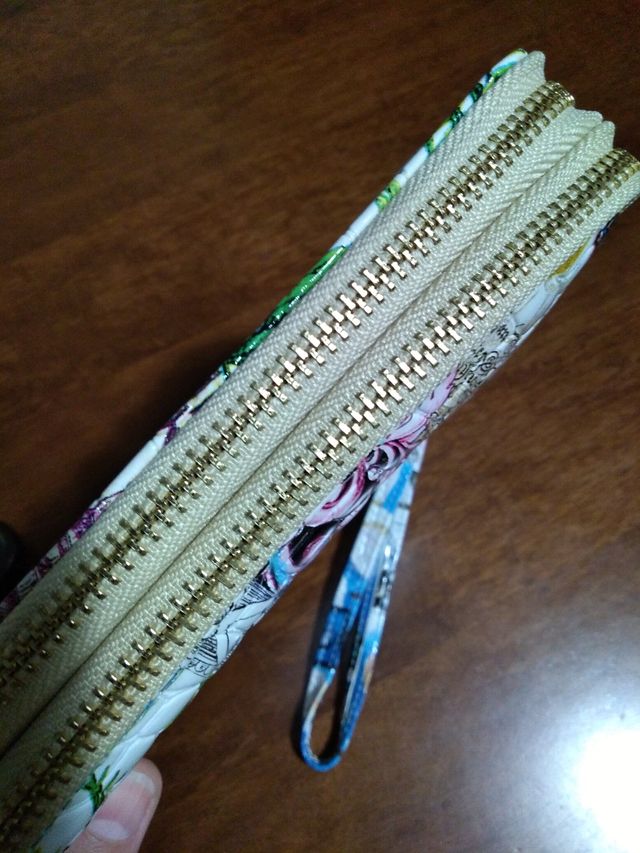 Portafoglio per banconote e monete