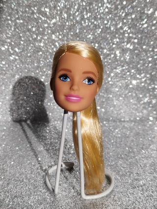Cabeza muñeca Barbie goma rosa.