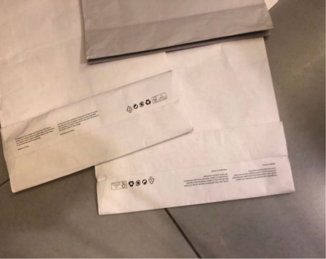 4 bolsas  de COS con asa  de tela , de papel