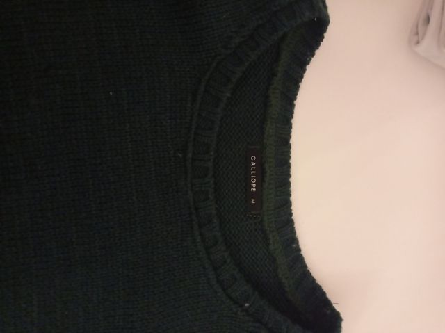 Maglione verde, dettaglio in pizzo