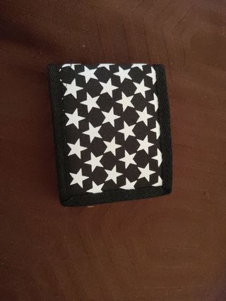 Cartera negra de estrellas