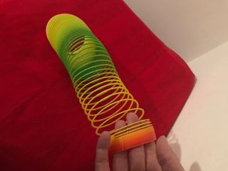 Juguete muelle magico colores arco iris