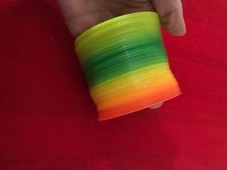 Juguete muelle magico colores arco iris