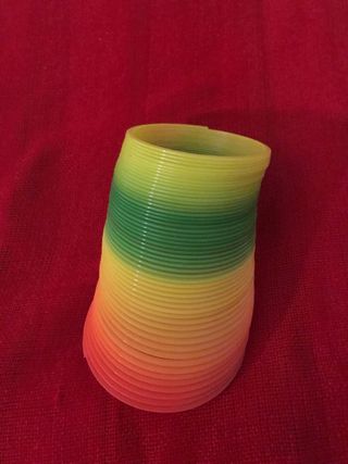 Juguete muelle magico colores arco iris