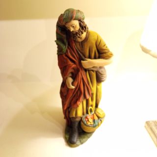 Pastor de Belén con ofrenda de frutas