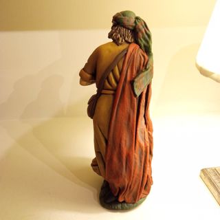 Pastor de Belén con ofrenda de frutas