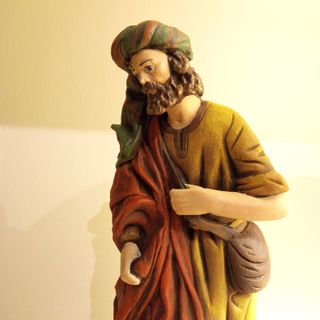 Pastor de Belén con ofrenda de frutas