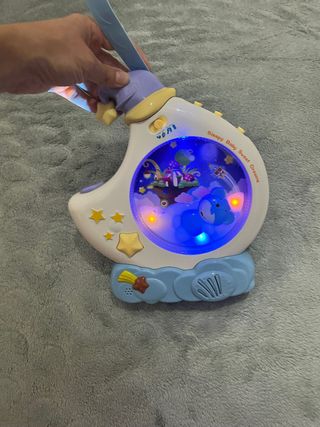 Proyector de luces y música bebés