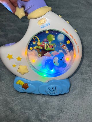 Proyector de luces y música bebés