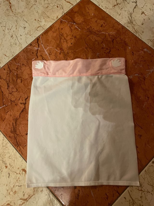 muñeca que se duerme con manta