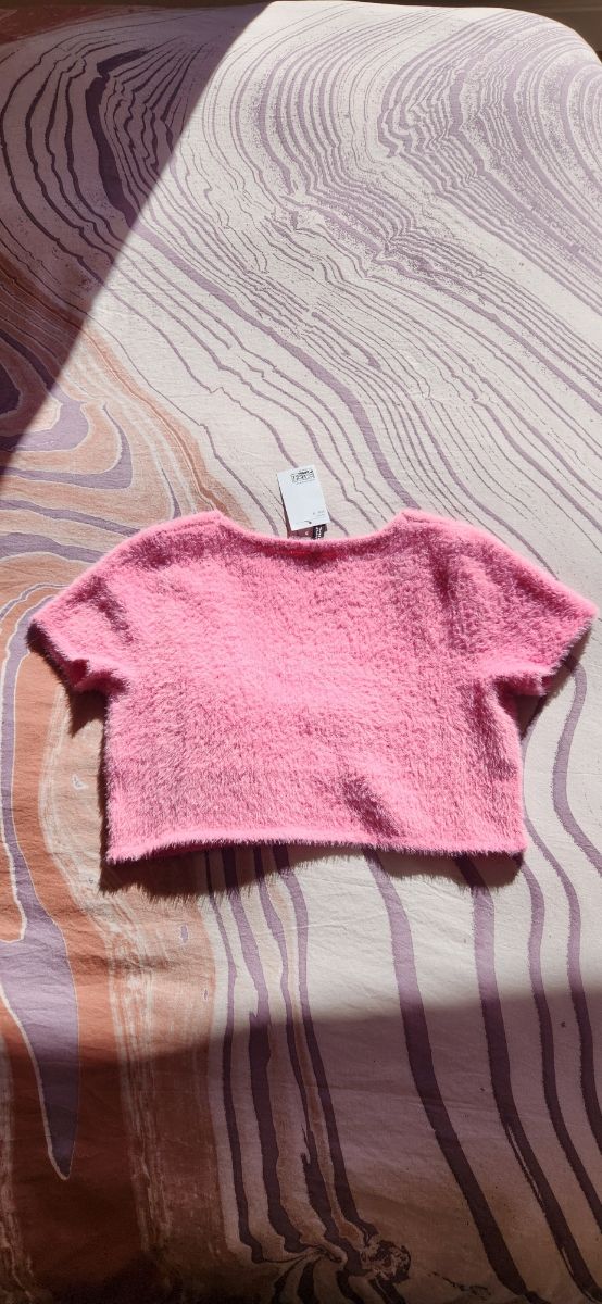 Top crop peludito rosa H&M S