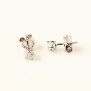 Pendientes 4 garras oro con brillante