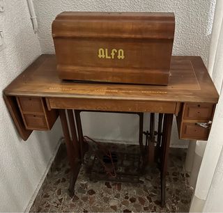 Maquina de coser.  Solo recogida.