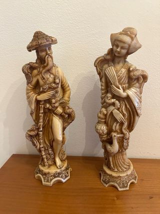 coppia statue orientali
