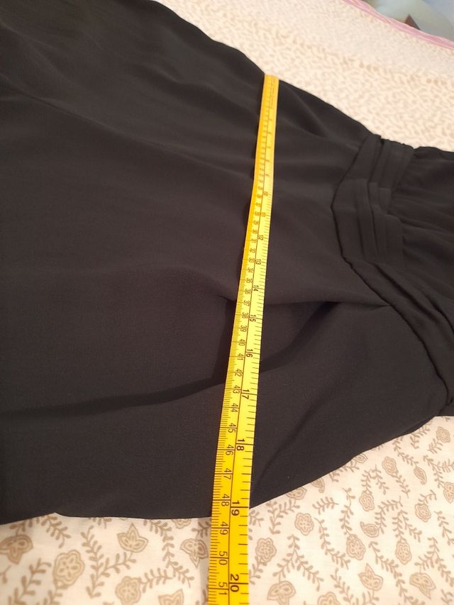 Mono negro con brillantes Zara