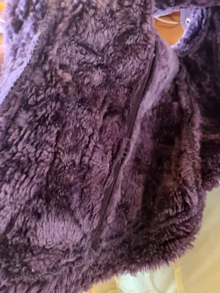 Chaleco piel vuelta talla L.