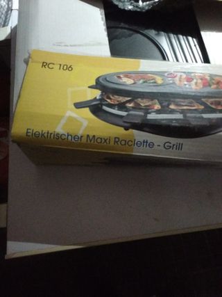 Asador sin estrenar ,planchas