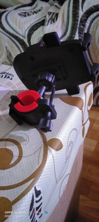 Adaptador para movil en bici.