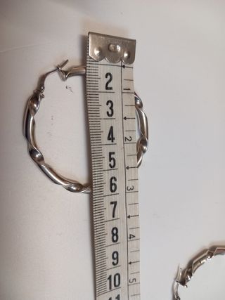 pendientes de plata de mujer.