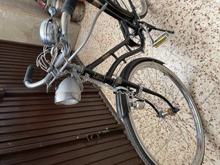 Bicicleta antigua de varillas