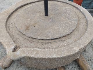 Prensa de piedra para uva