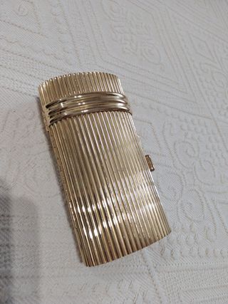 Clutch dorado rijido con cadena .