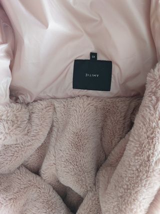 Plumas Rosa claro marca AMTIE. Talla XS