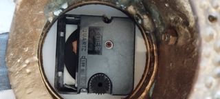 Conjunto candelabros y reloj de bronce