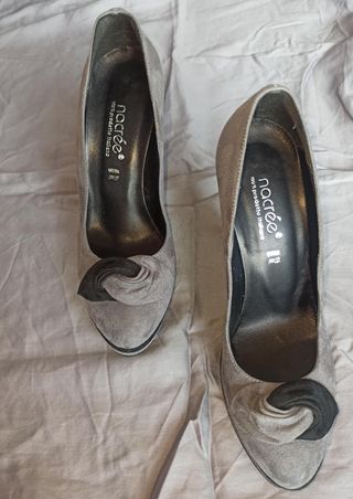 Scarpe con tacchi alti