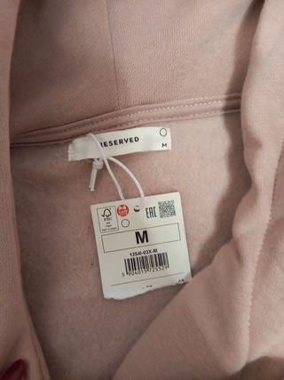 Chaqueta rosa nueva con etiqueta