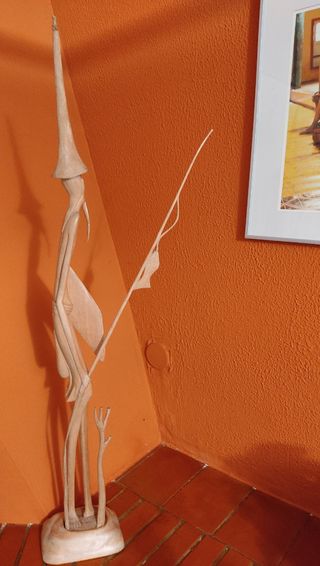 Escultura de madera pescador