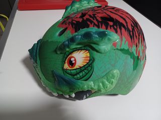 Casco dinosaurio  niño bici