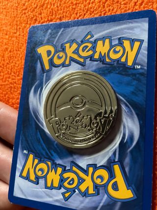 Moneta pokemon Charizard in metallo