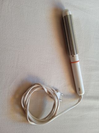 Rizador de pelo marca Braun.