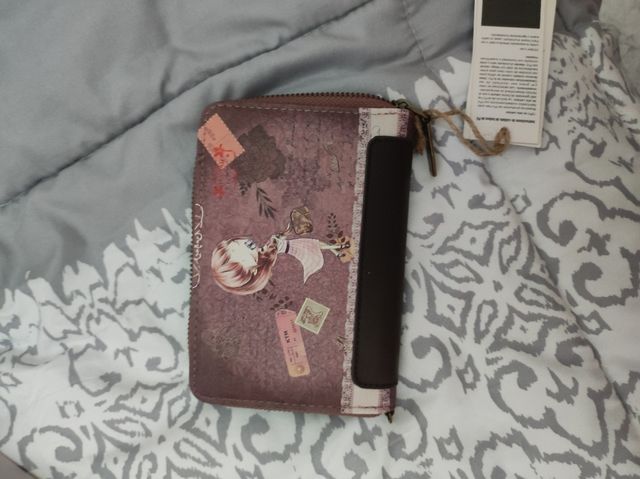 Monedero muñeca nuevo.