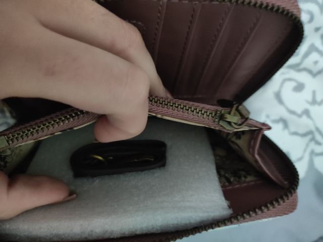 Monedero muñeca nuevo.