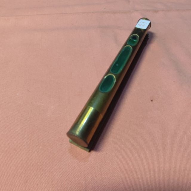 Livella antica in ottone