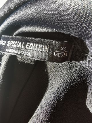 Mono negro de vestir. XS/S