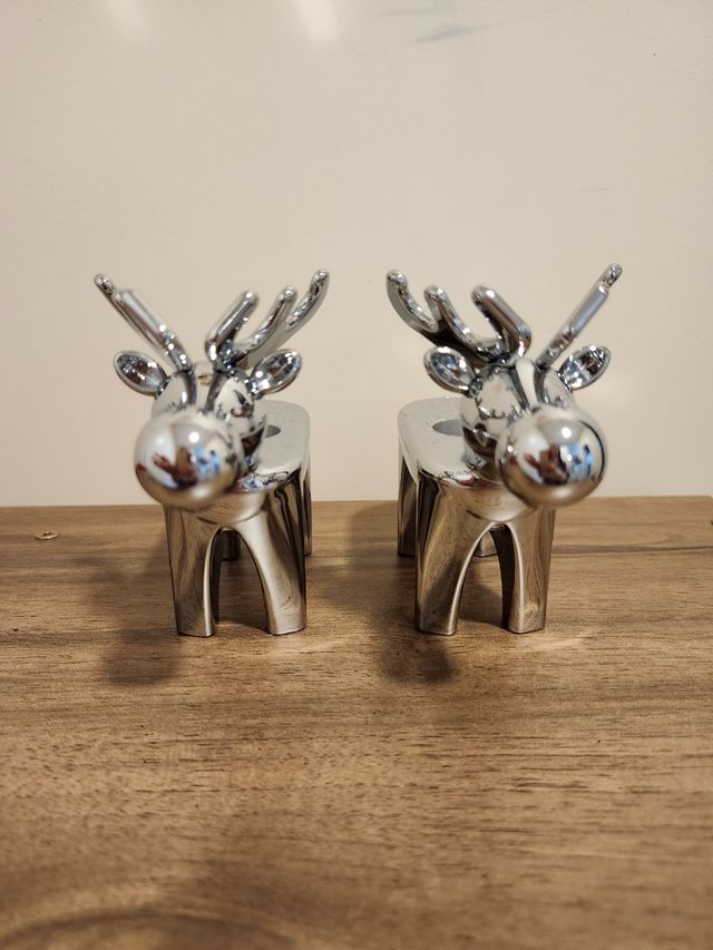 Candelabros de acero inoxidable de reno