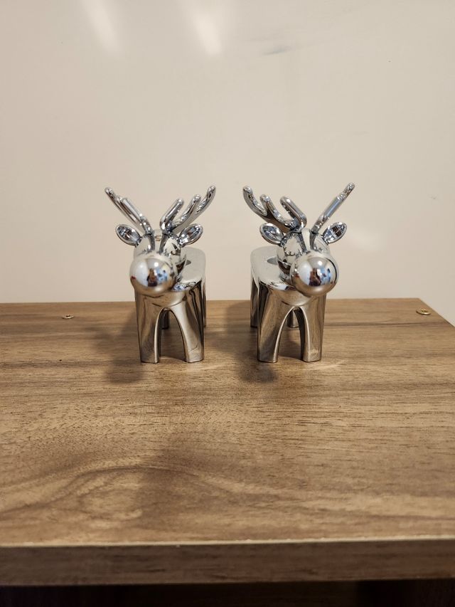 Candelabros de acero inoxidable de reno