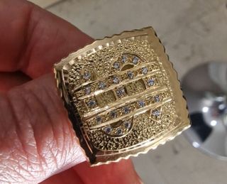 SELLO ORO  18KT DOLARS 33 gr