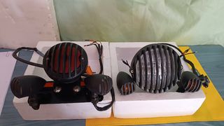 Conjunto de Faro del y tras do mcicleta