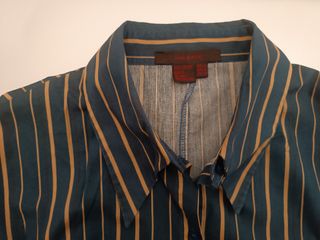 Blusa azul manga larga rayas doradas