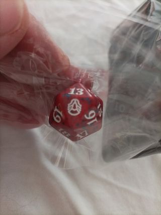 Lote 33,Bolsa dados mas 1 dado Magic The Gathering