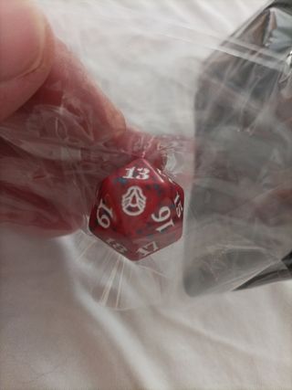 Lote 33,Bolsa dados mas 1 dado Magic The Gathering