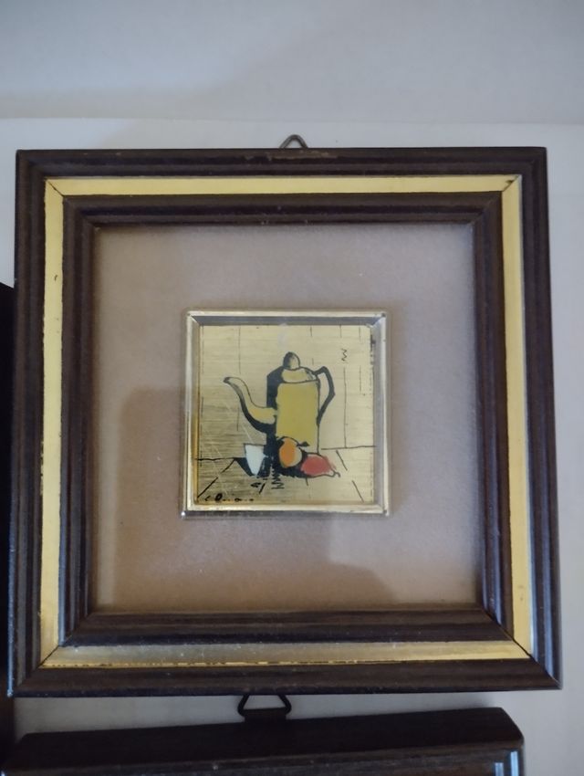 Quadretti su foglia oro